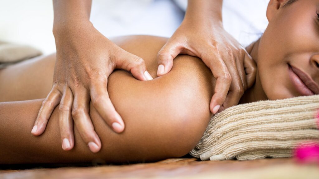 Benefits of Deep Tissue Massage Therapy for Tense Muscles A woman getting the benefits of deep tissue massage therapy for tense muscles