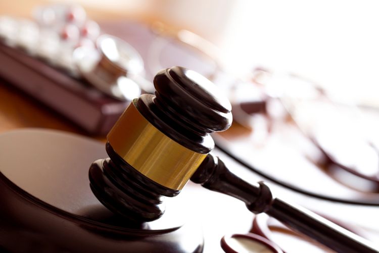 Young woman meeting lawyer in drug case