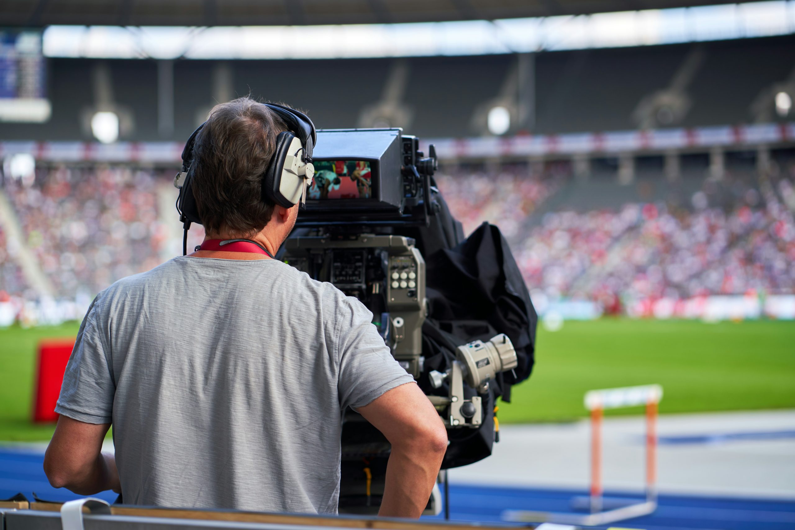 Sports Broadcasting: Bringing Fast-Paced Action to Every Device norbert braun rbUmyKlVyZU unsplash scaled