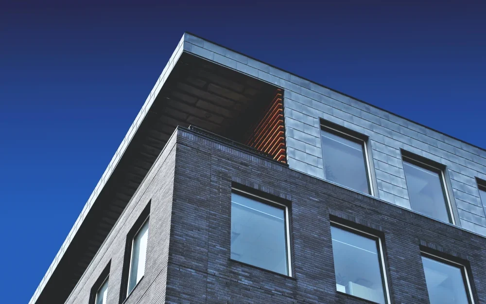 How Energy-Efficient Windows Reduce Household Bills: The Financial Reality Behind Modern Window Upgrades windows on a building 1000x625 1